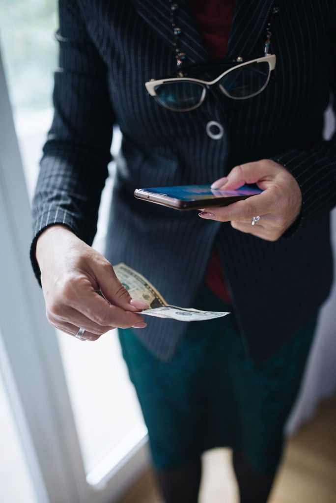 person using crypto wallet on phone